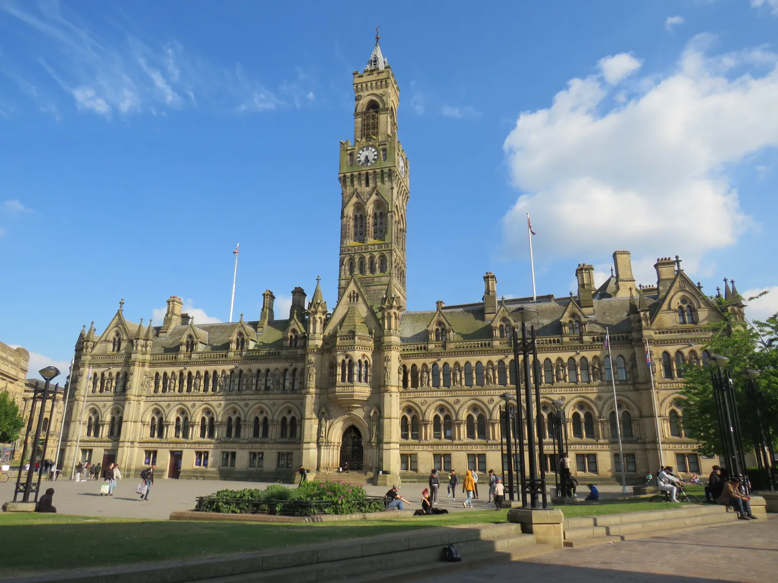 Bradford City Hall's clock tower above City Park on a sunny day